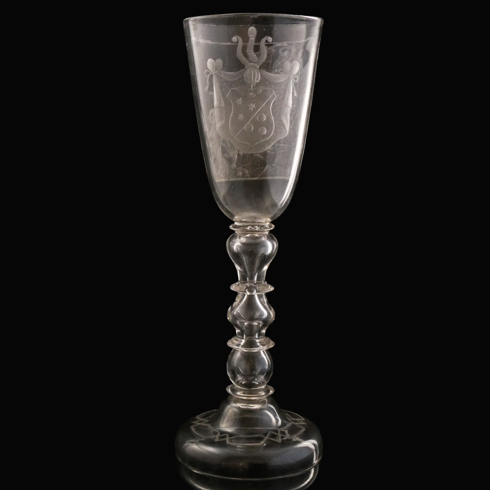 Germany, large engraved glass goblet with armorial and martial scene, Bohemian or Thuringian