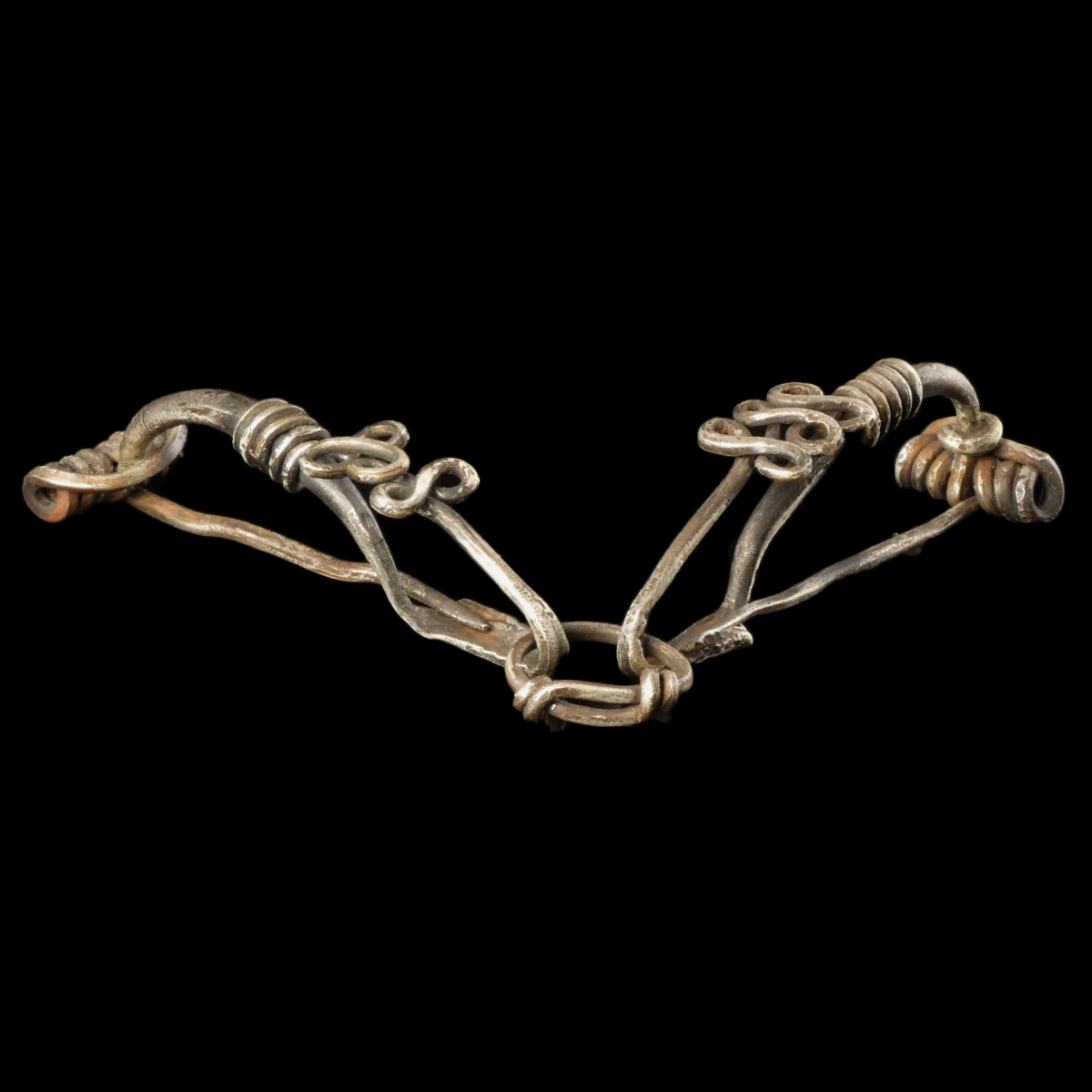 Iron Age, pair of silver Celtic La Tène connected fibulae