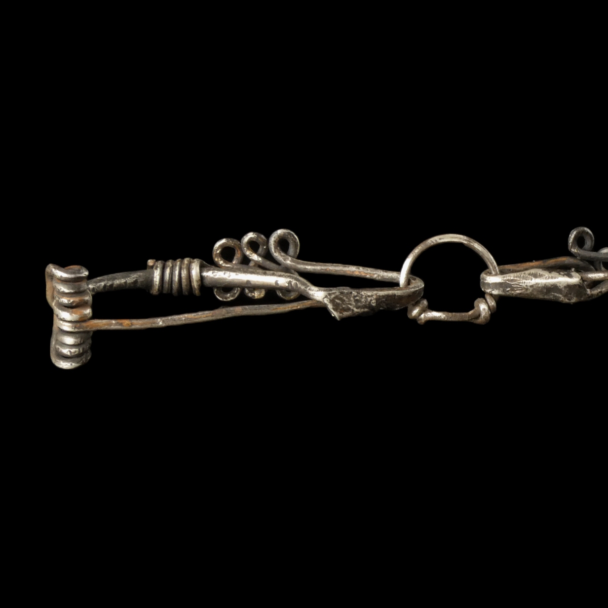 Iron Age, pair of silver Celtic La Tène connected fibulae