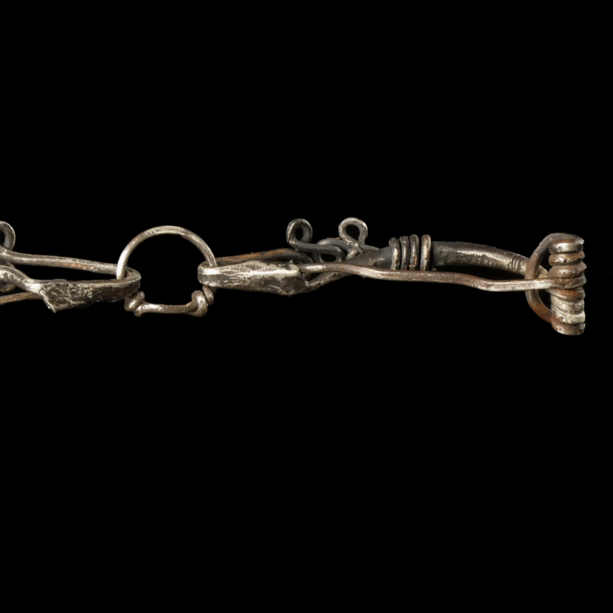 Iron Age, pair of silver Celtic La Tène connected fibulae