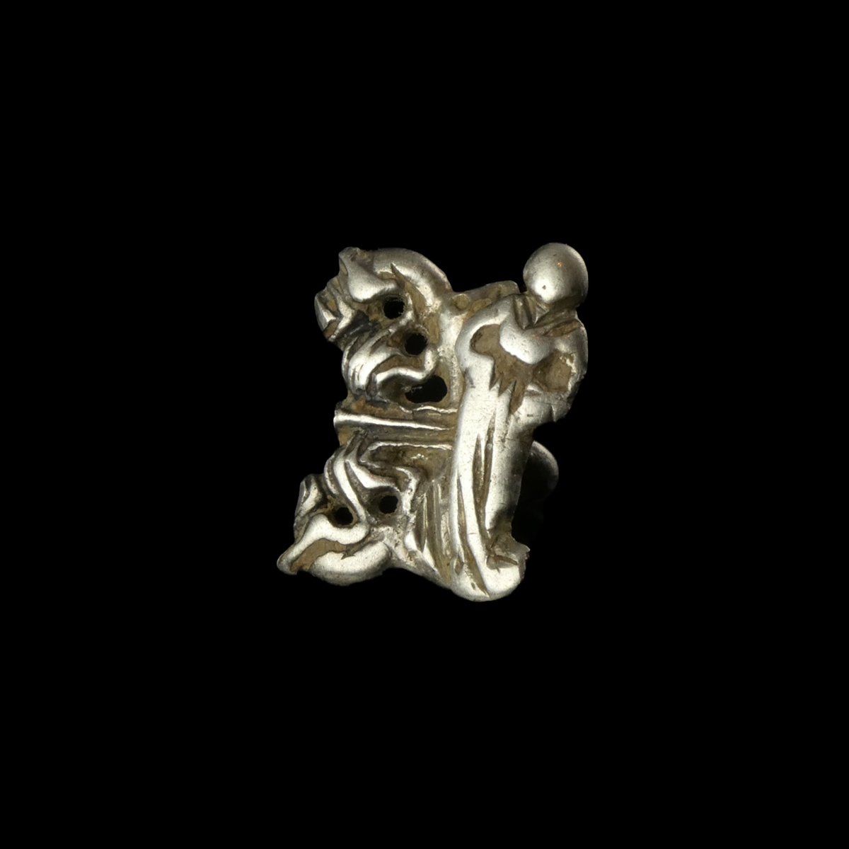 Late Medieval silver openwork dress hook with female figure and floral decoration