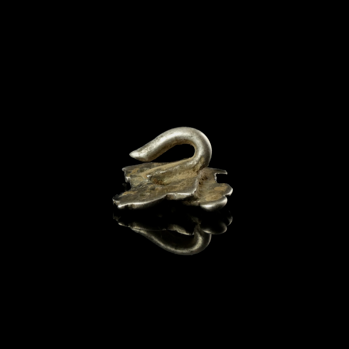 Late Medieval silver openwork dress hook with female figure and floral decoration