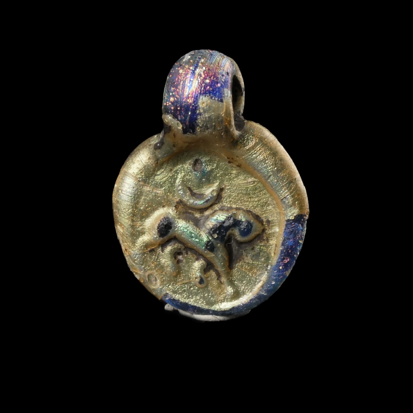 Late Roman Glass Amulet Pendant with Lion, Moon and Sun / Star