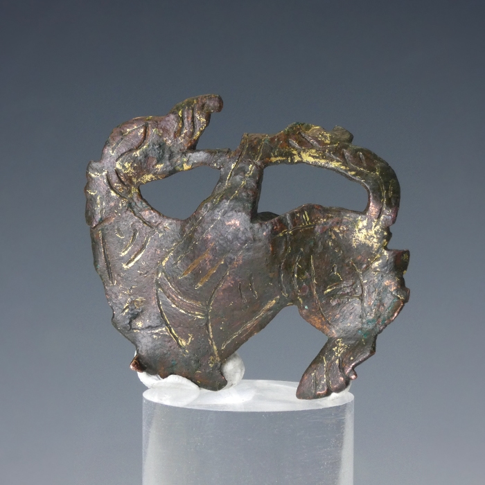 Medieval stud or mount with griffin