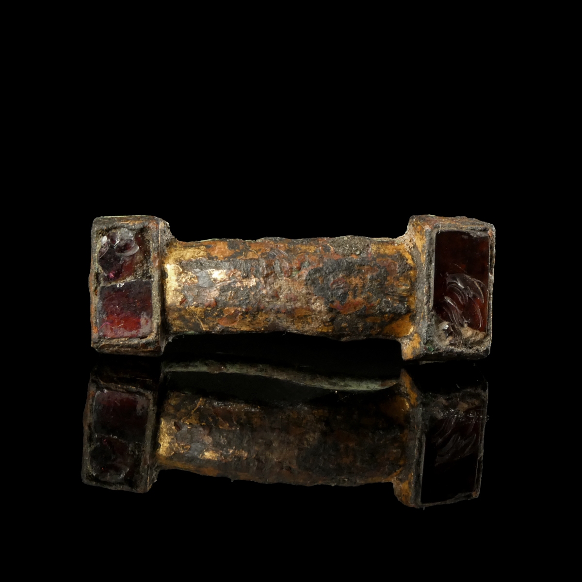 Migration Period, Frankish equal armed gilded bronze brooch with garnet