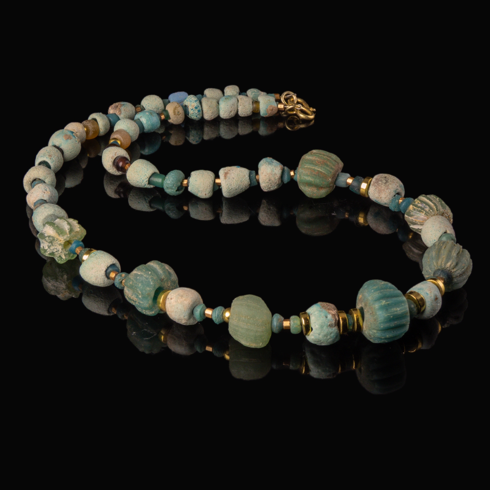 Necklace with ancient Egyptian faience, melon and glass beads