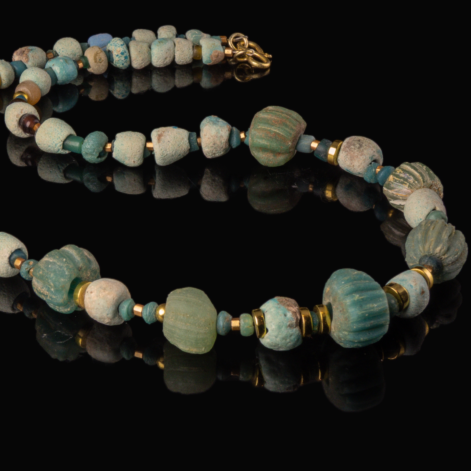 Necklace with ancient Egyptian faience, melon and glass beads