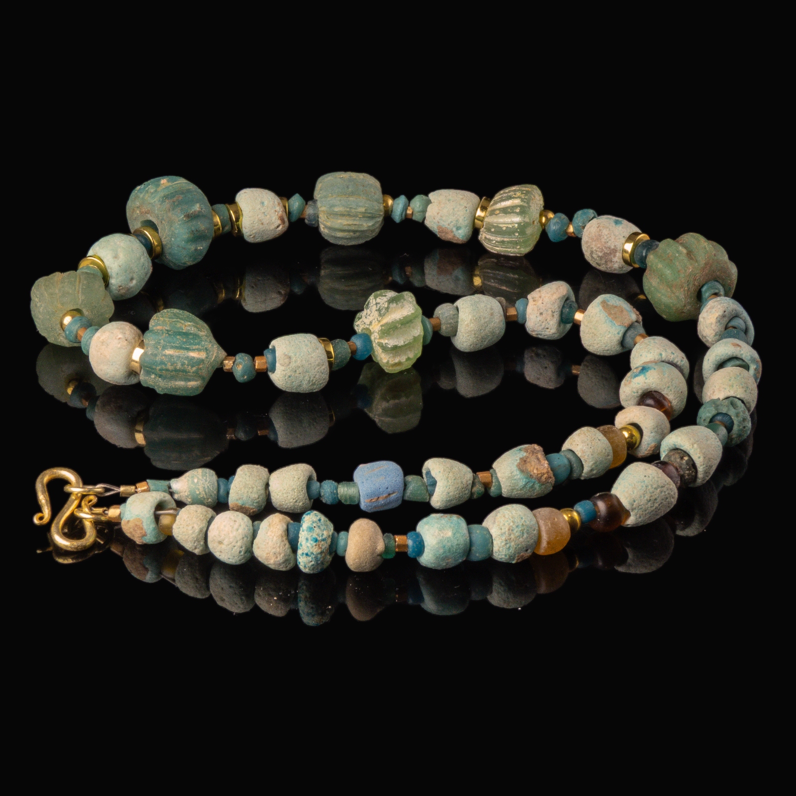 Necklace with ancient Egyptian faience, melon and glass beads