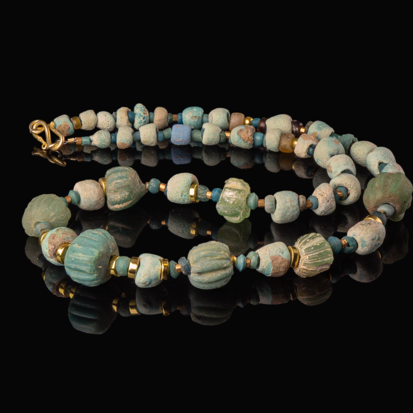 Necklace with ancient Egyptian faience, melon and glass beads