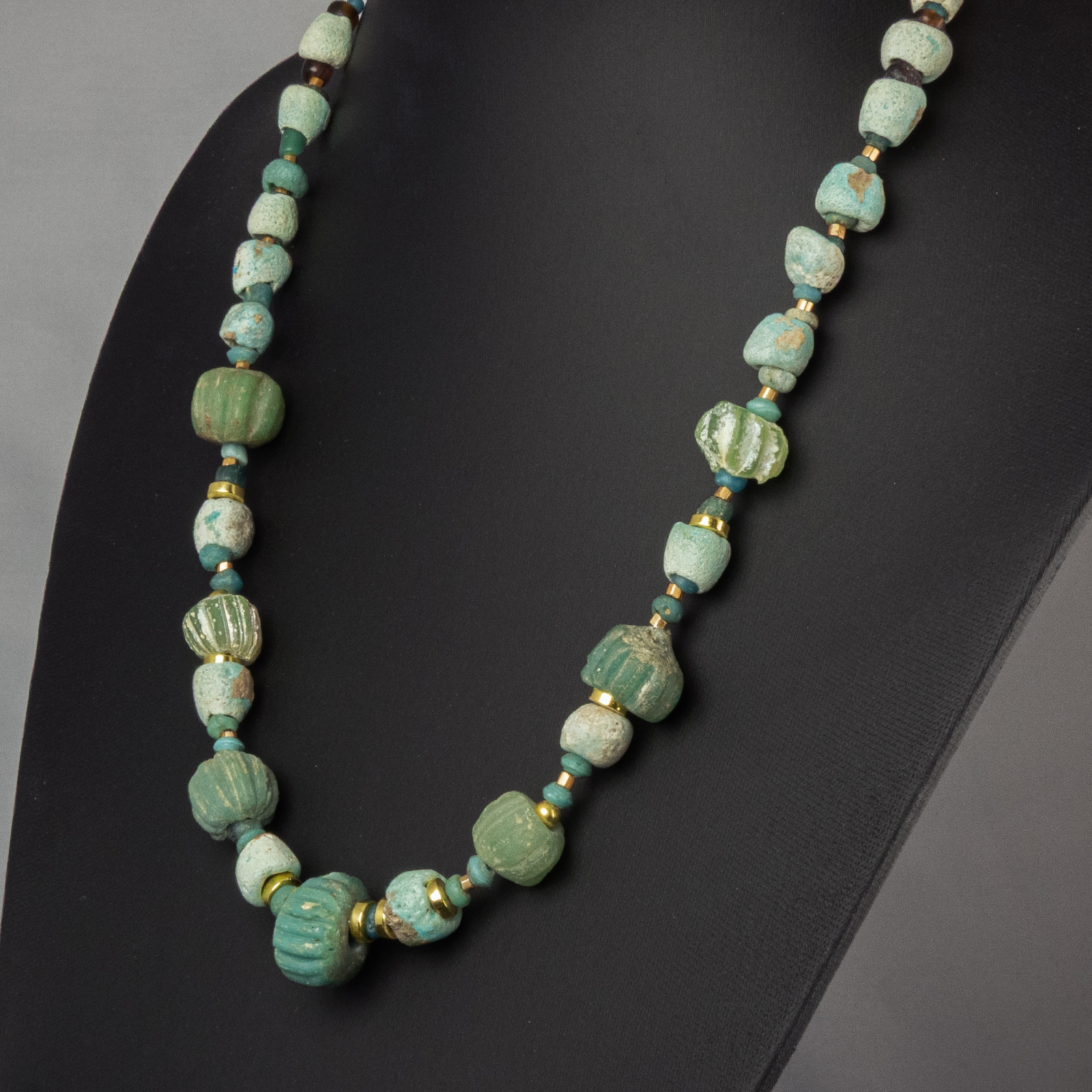 Necklace with ancient Egyptian faience, melon and glass beads