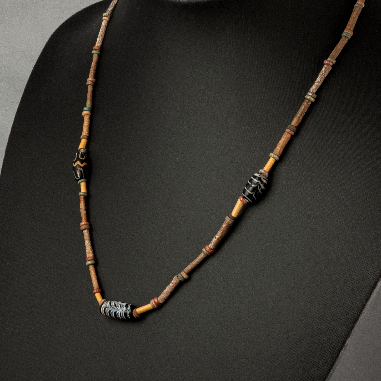 Necklace with ancient Egyptian multicoloured faience and decorated polychrome glass beads