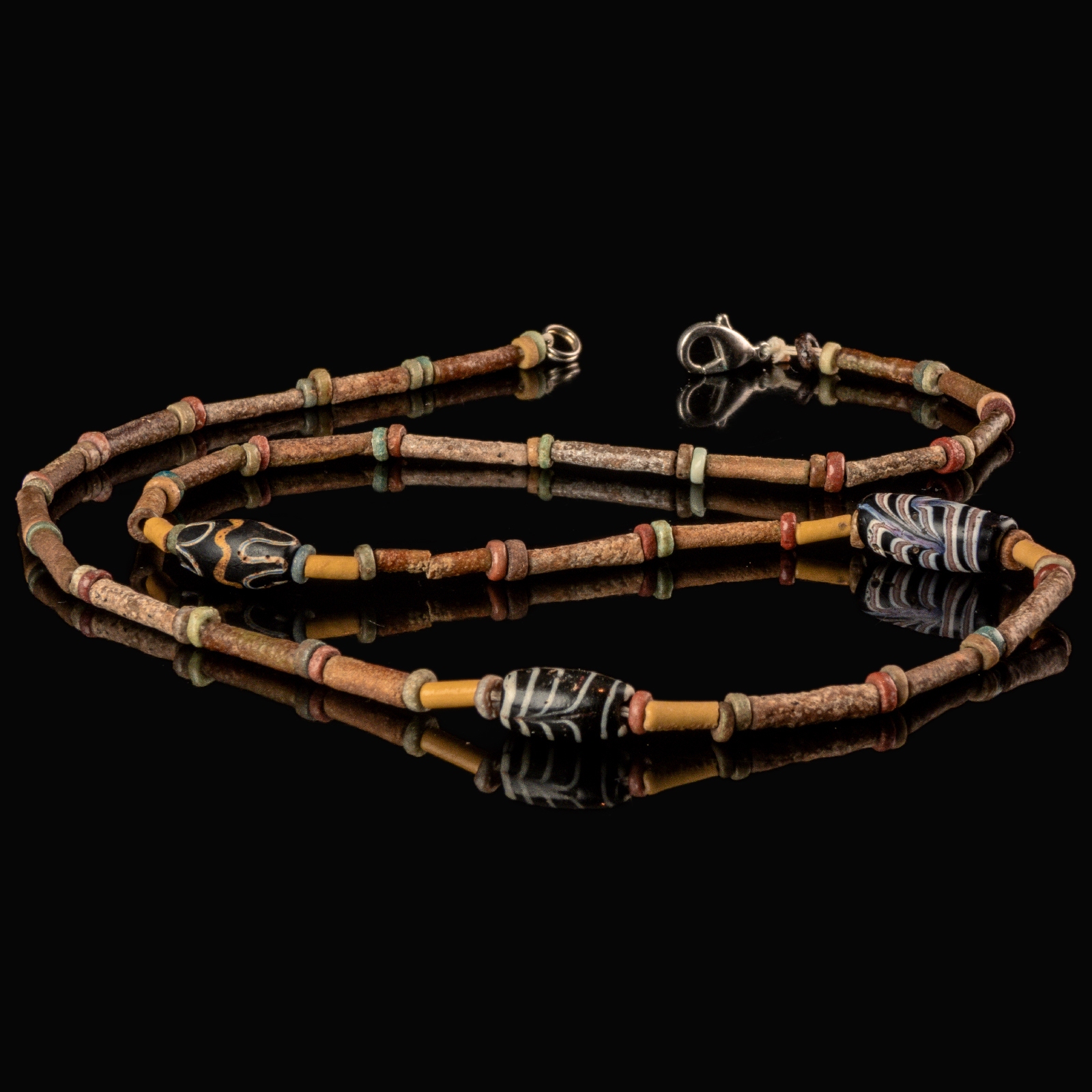 Necklace with ancient Egyptian multicoloured faience and decorated polychrome glass beads