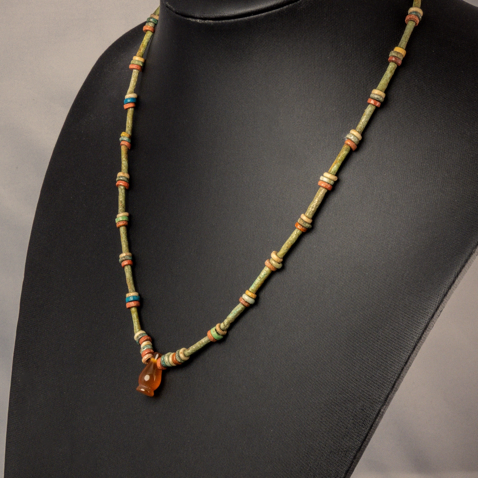 Necklace with ancient Egyptian multicoloured faience beads and carnelian poppy amulet