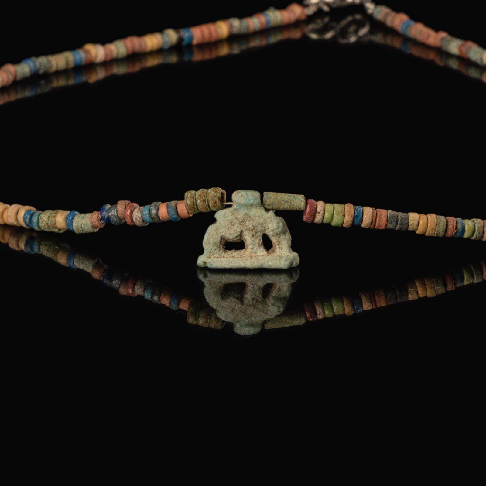 Necklace with ancient Egyptian multicoloured faience beads with a Goddess Nut as a sow amulet