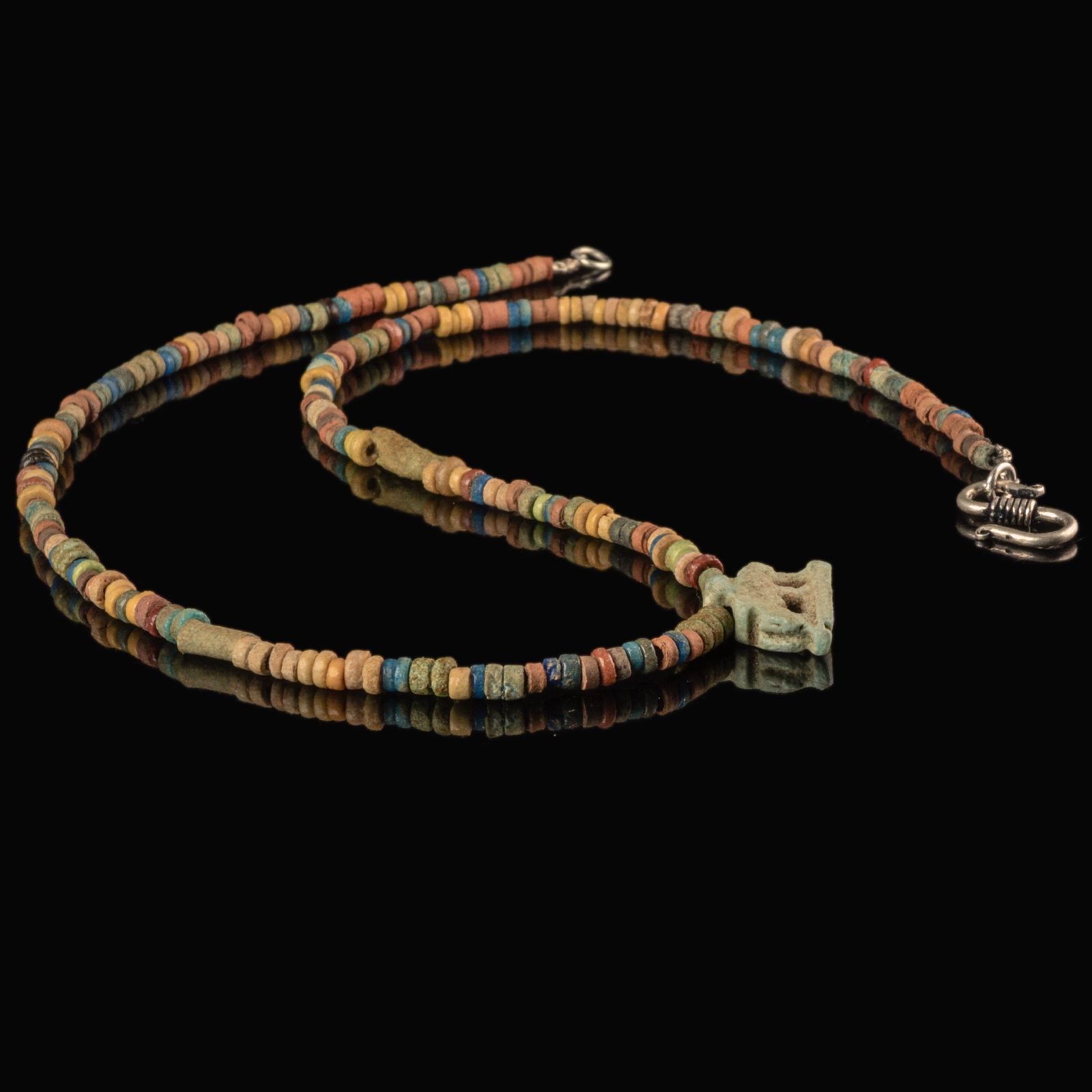 Necklace with ancient Egyptian multicoloured faience beads with a Goddess Nut as a sow amulet