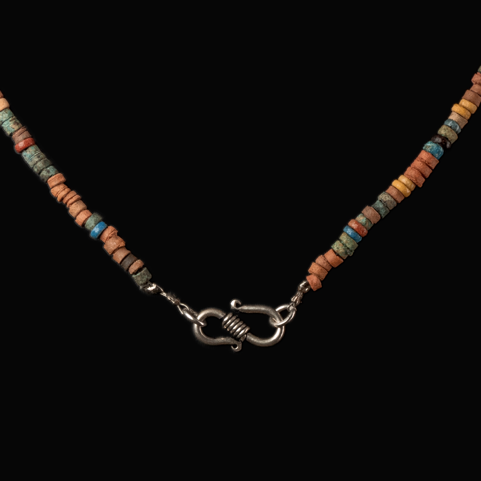 Necklace with ancient Egyptian multicoloured faience beads with a Goddess Nut as a sow amulet