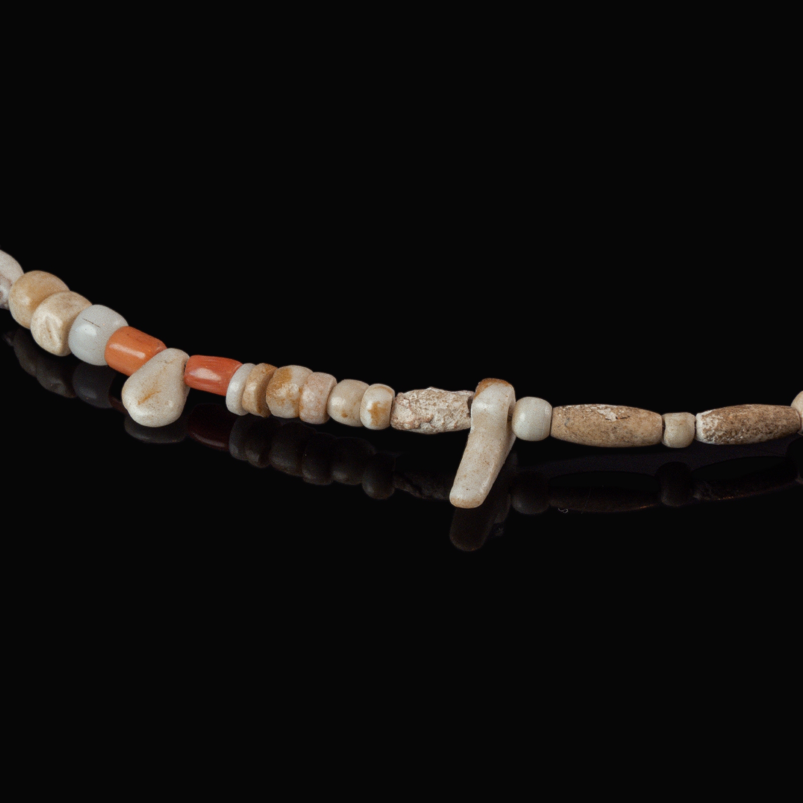 Necklace with ancient stone, shell and coral beads
