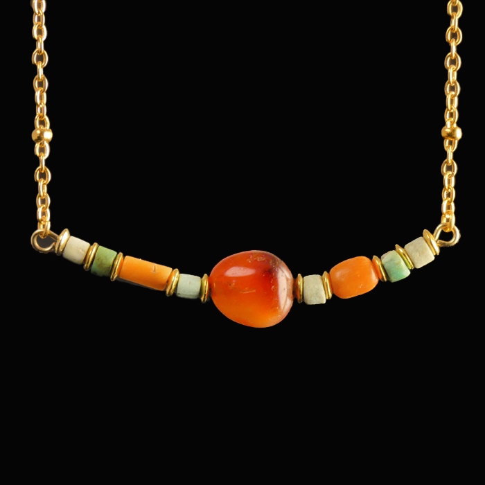 Necklace with Egyptian faience, carnelian and coral beads