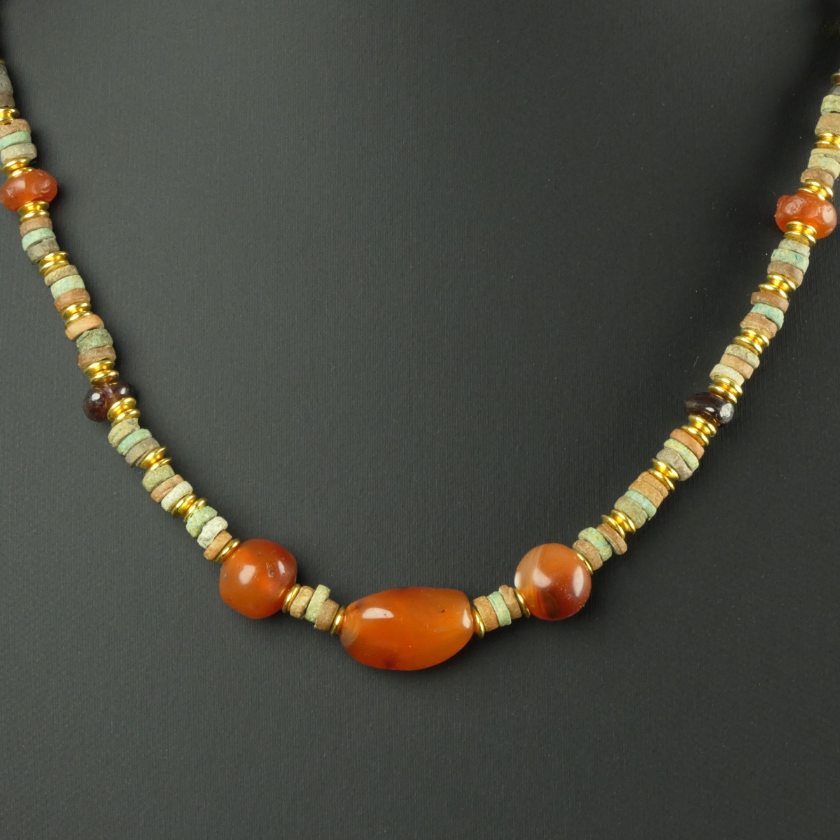Necklace with Egyptian faience, carnelian and garnet beads