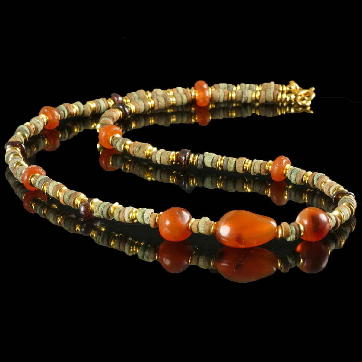 Necklace with Egyptian faience, carnelian and garnet beads