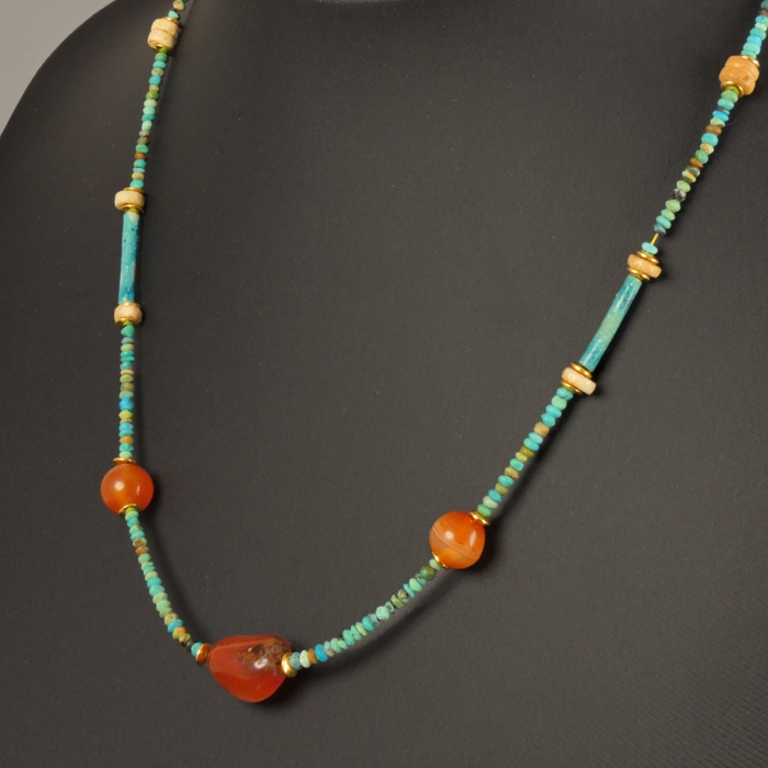 Necklace with Egyptian faience and carnelian beads