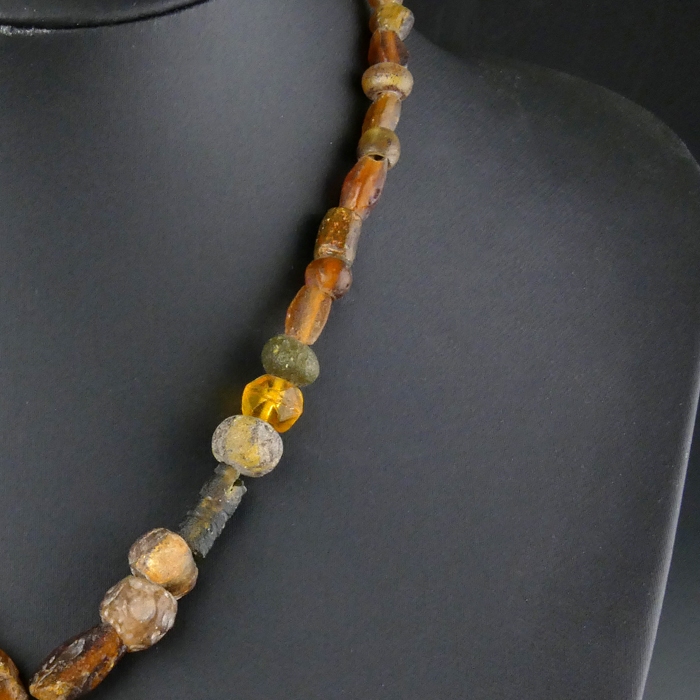 Necklace with Roman amber colour glass beads