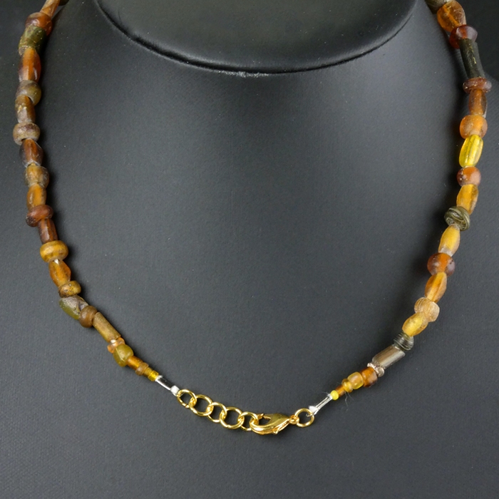 Necklace with Roman amber colour glass beads
