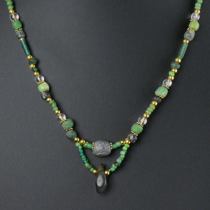 Necklace with Roman green glass and stone beads