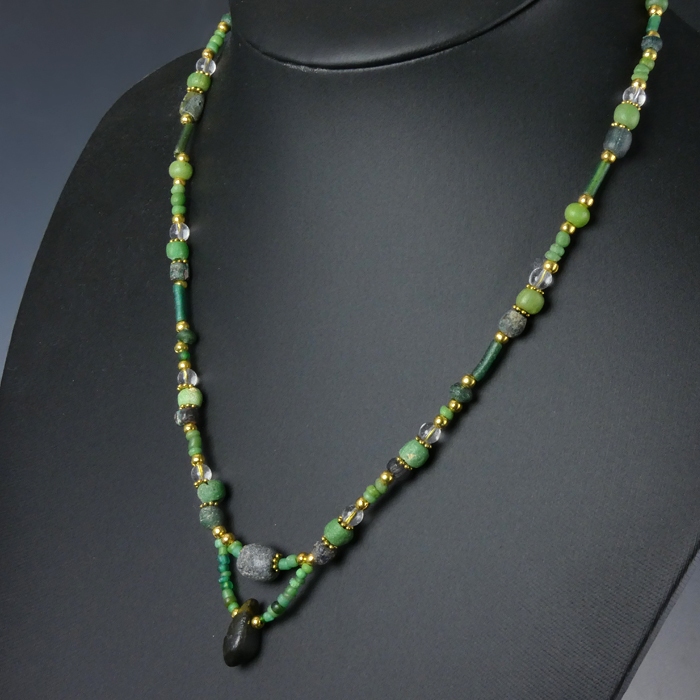 Necklace with Roman green glass and stone beads