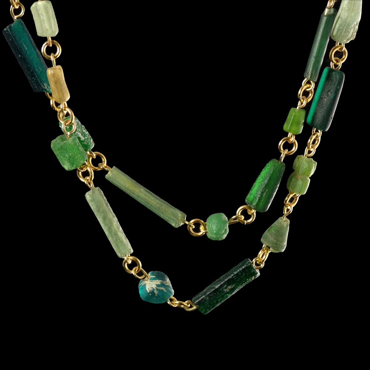 Necklace with Roman green glass beads in a linked design