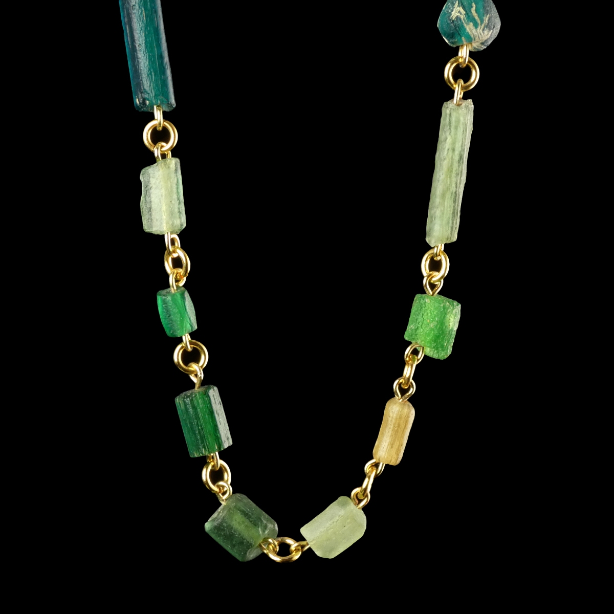 Necklace with Roman green glass beads in a linked design