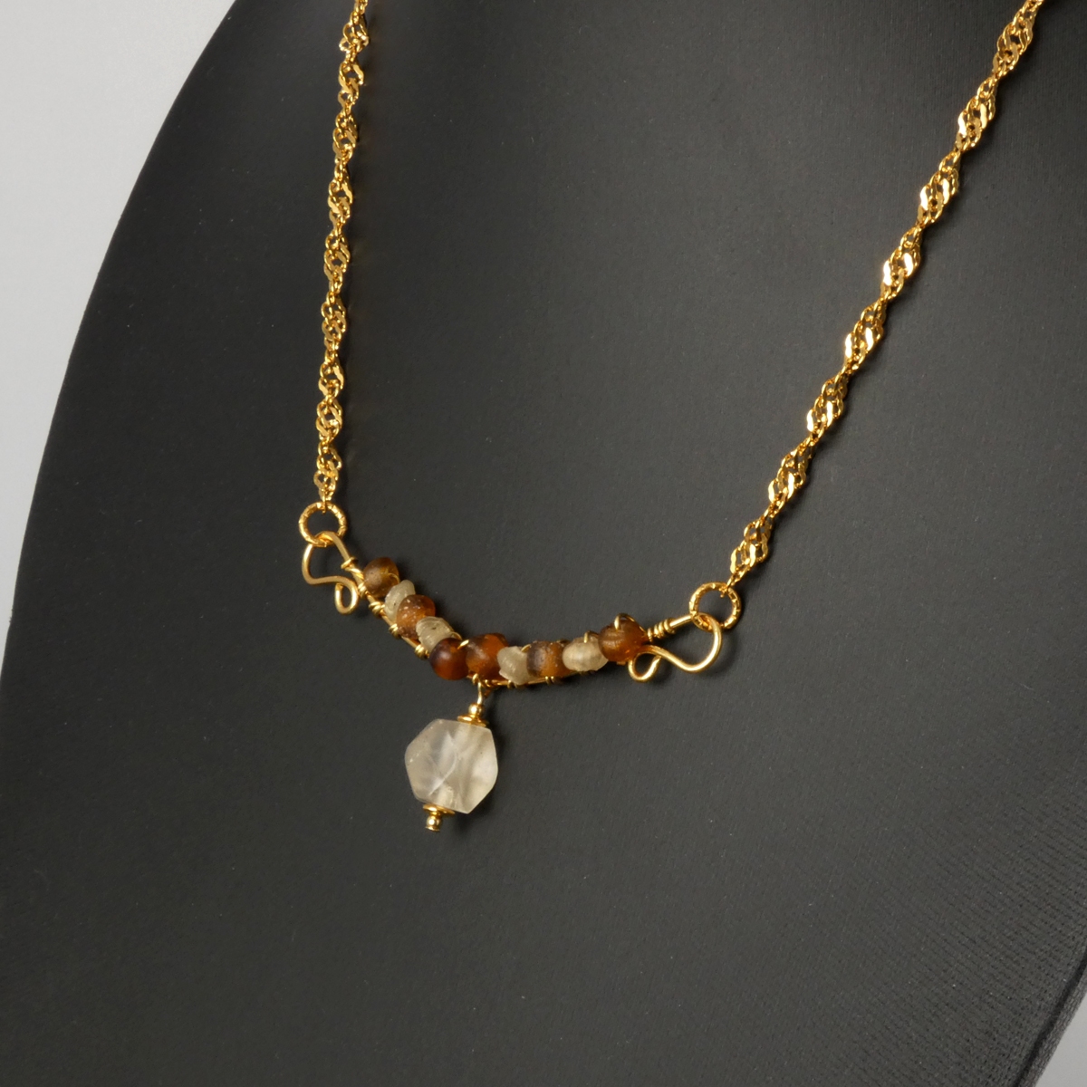 Necklace with wire-wrapped Roman amber and semi-translucent glass beads