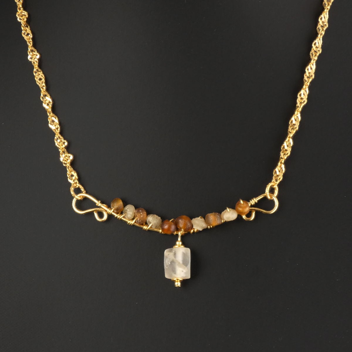 Necklace with wire-wrapped Roman amber and semi-translucent glass beads