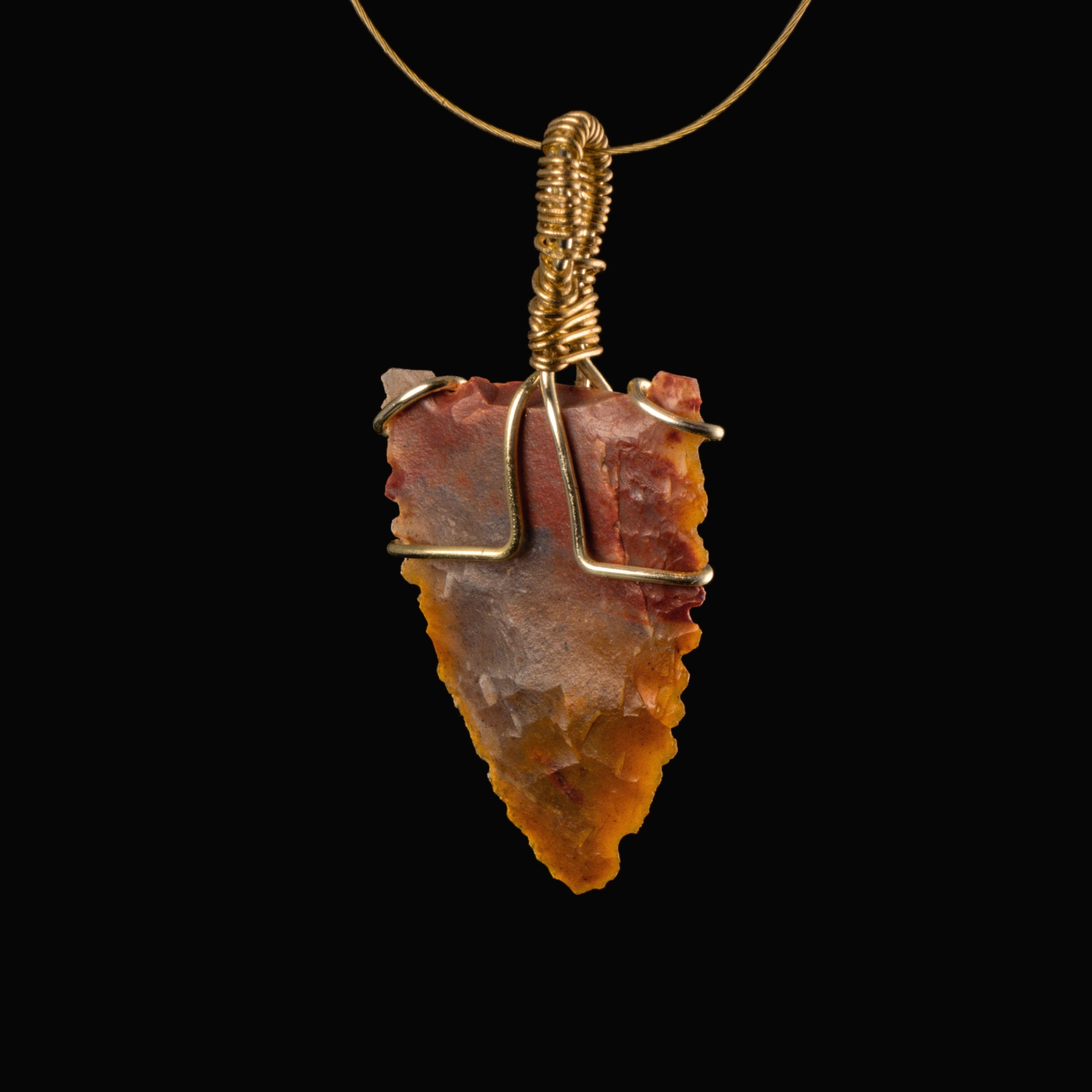 Neolithic wire-wrapped stone arrowhead pendant