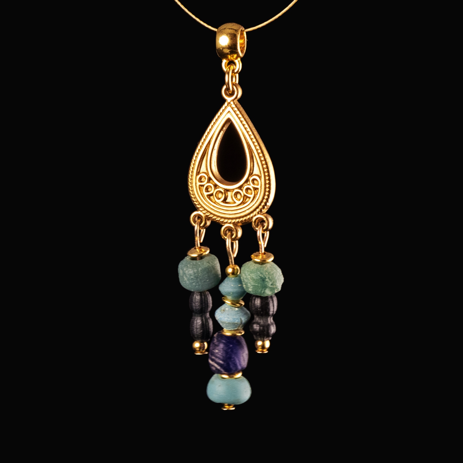 Pendant with Roman blue and turquoise glass beads