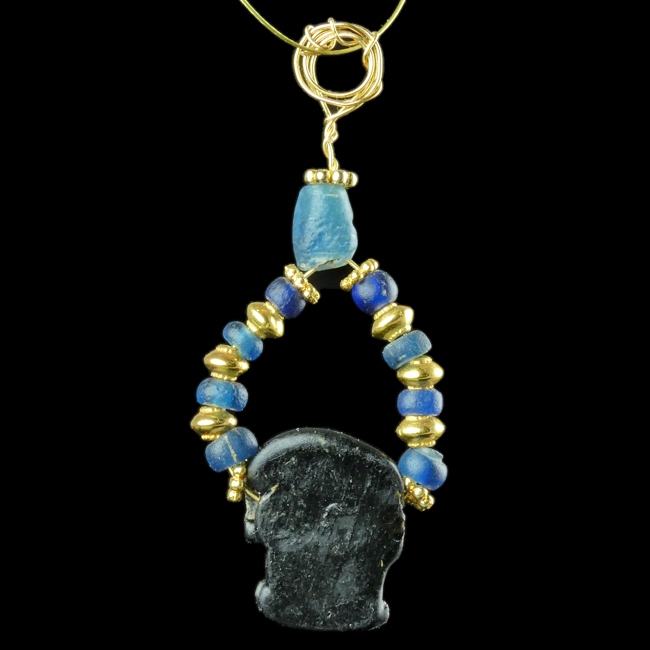 Pendant with Roman blue glass and amulet bead