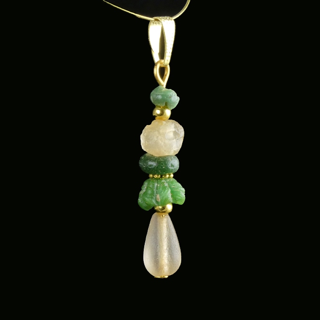 Pendant with Roman green and semi-translucent glass beads