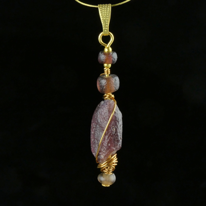 Pendant with wire-wrapped Roman purple glass beads