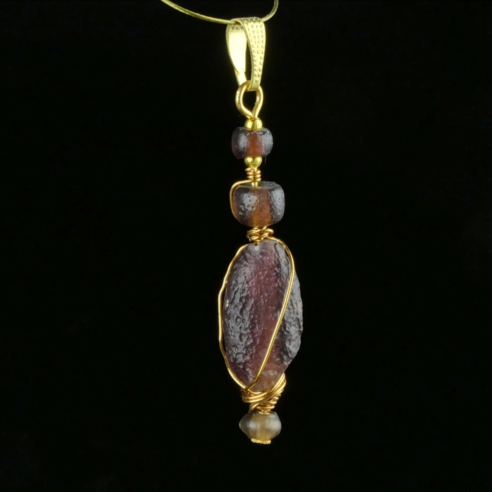 Pendant with wire-wrapped Roman purple glass beads