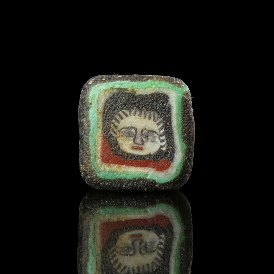 Romano-Egyptian mosaic glass face bead