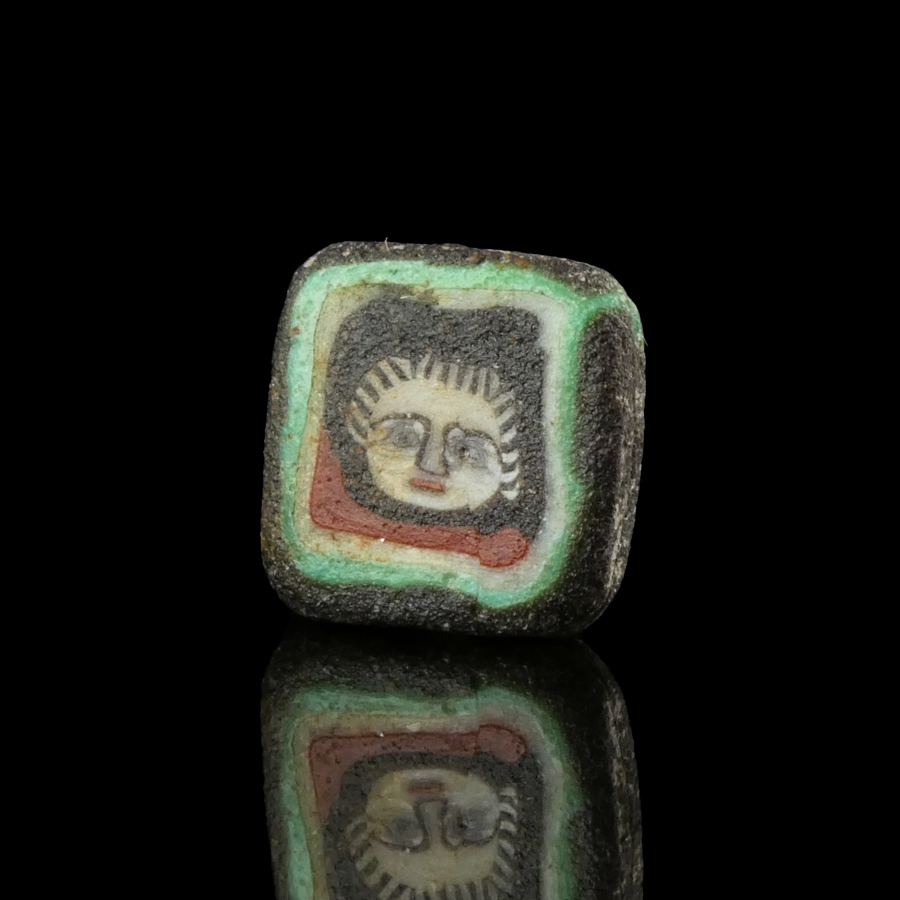 Romano-Egyptian mosaic glass face bead