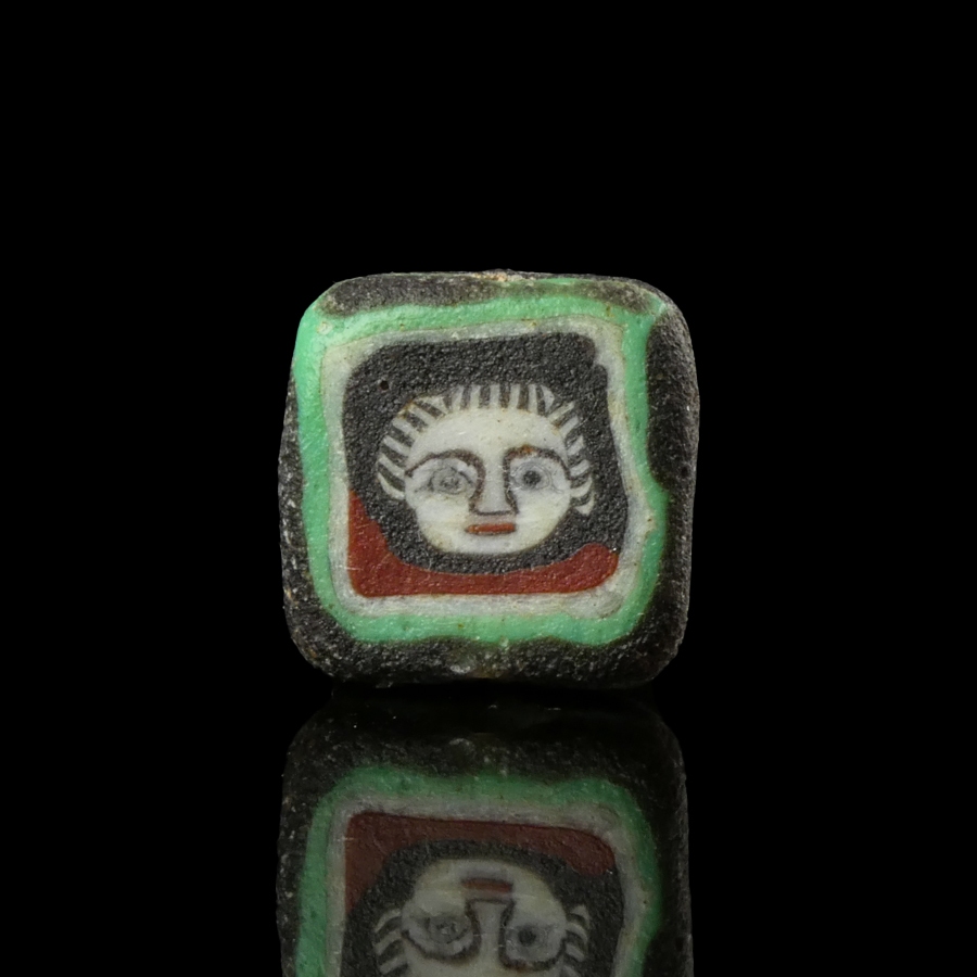 Romano-Egyptian mosaic glass face bead