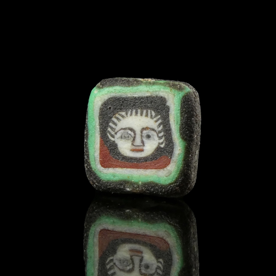 Romano-Egyptian mosaic glass face bead