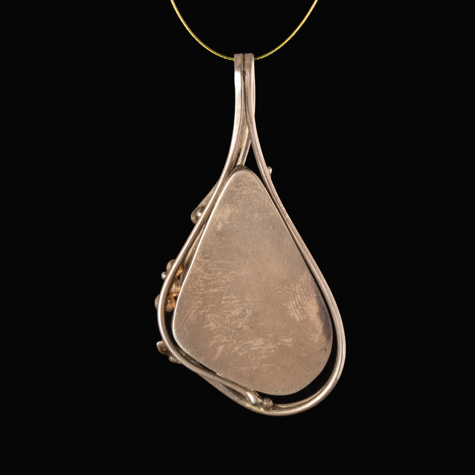 Silver pendant with iridescent Roman glass, custom-designed
