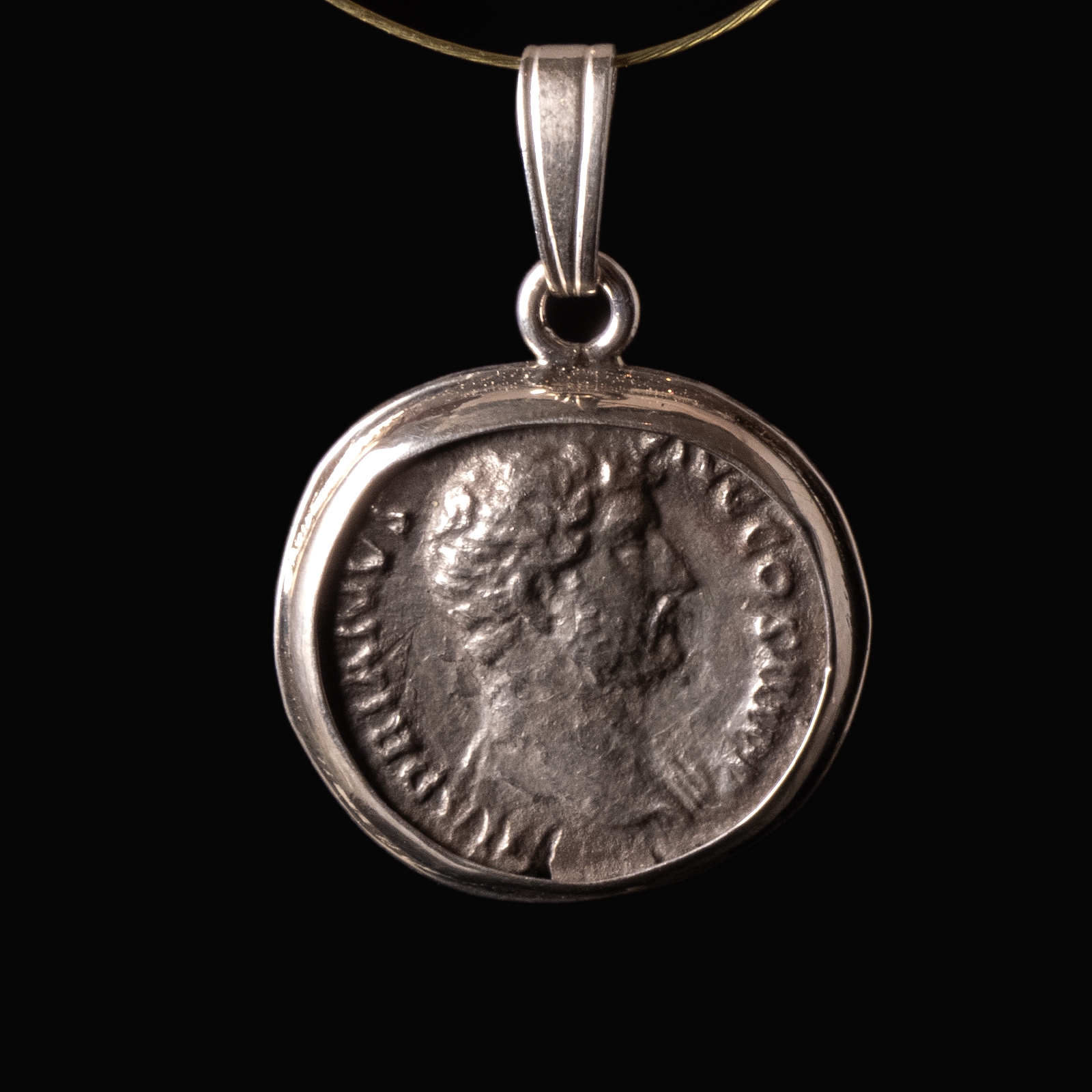 Silver pendant with Roman coin of Hadrian