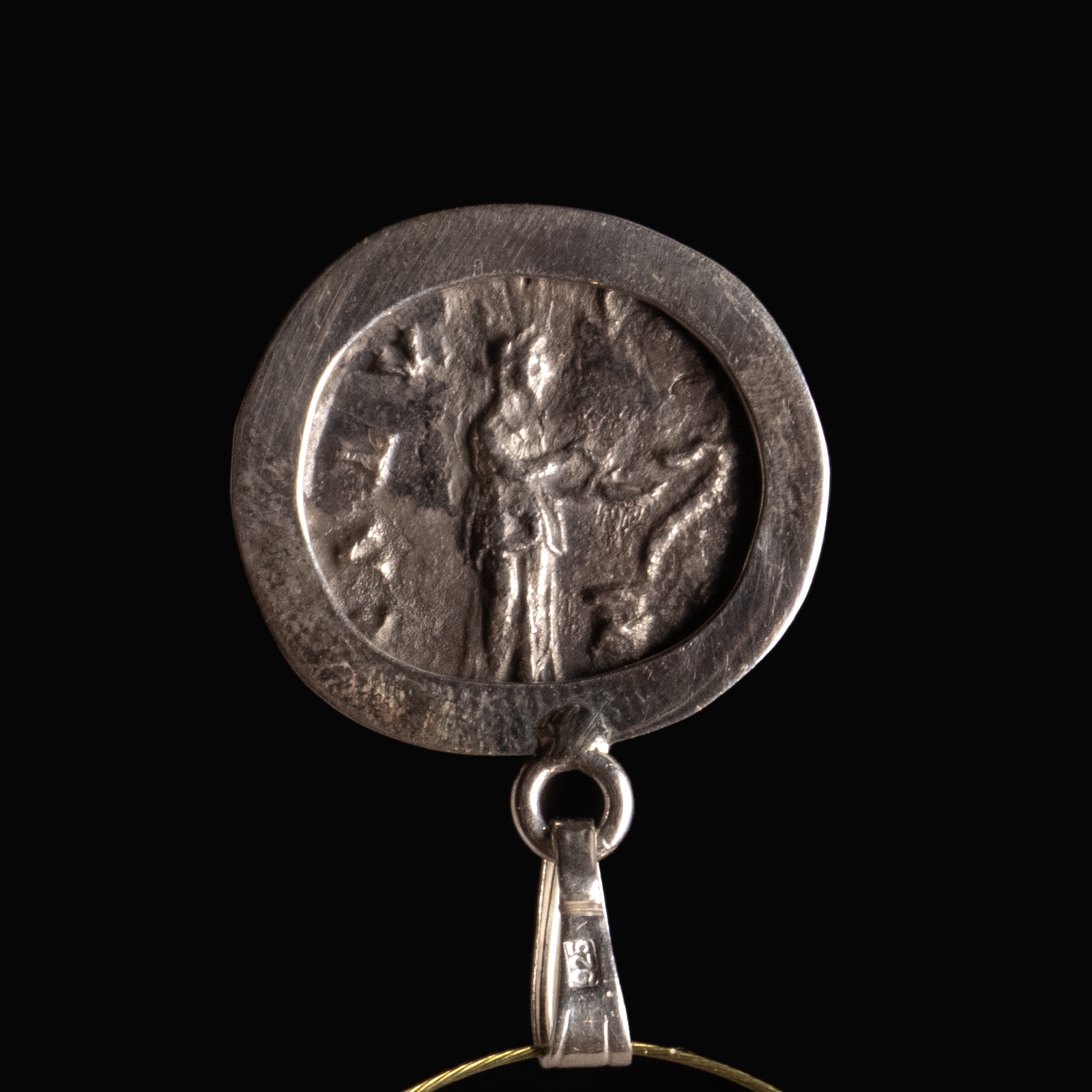 Silver pendant with Roman coin of Hadrian