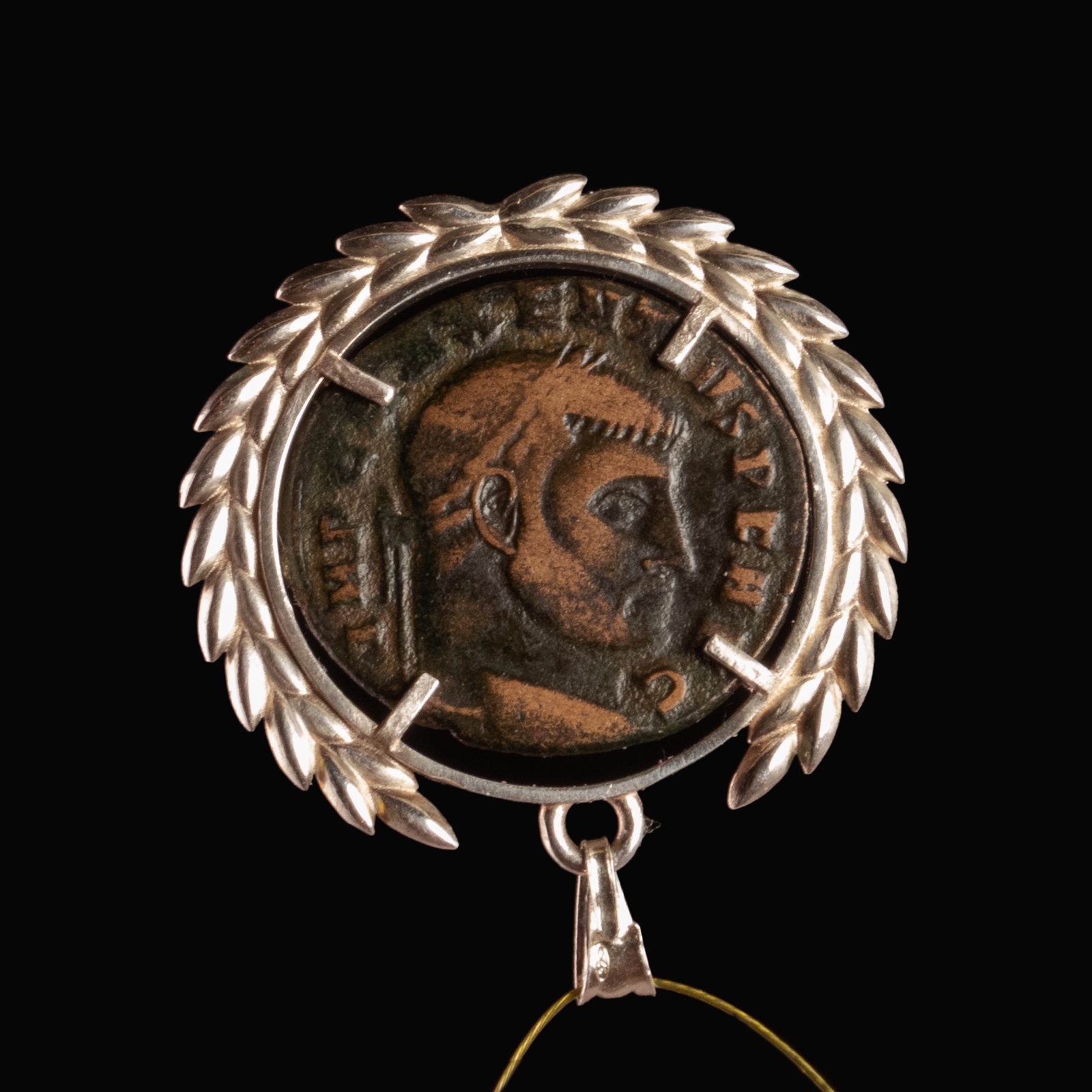 Silver pendant with Roman coin of Maxentius