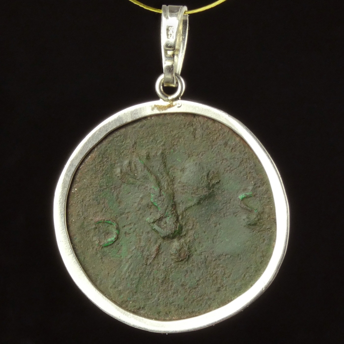 Silver pendant with Roman coin of Nero