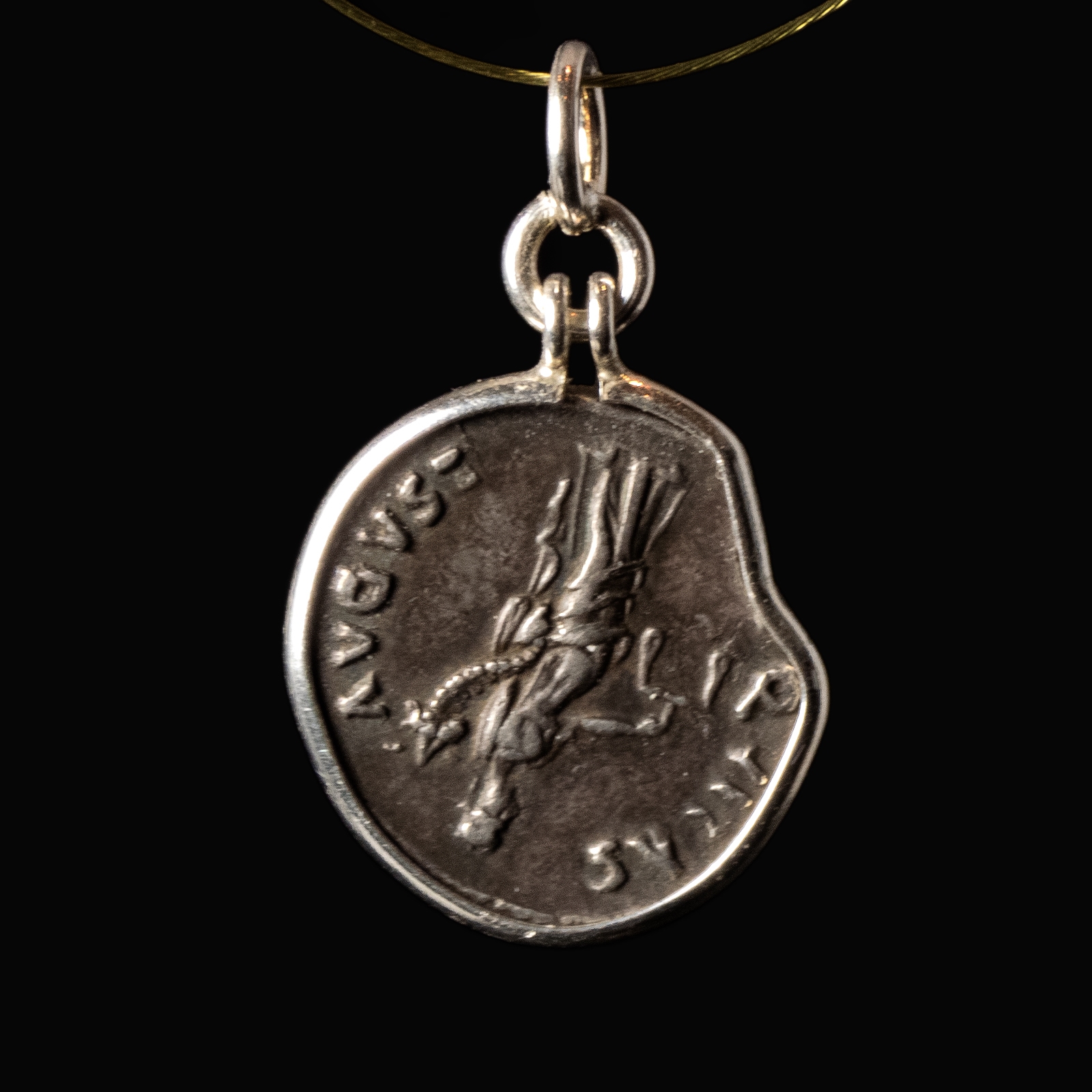 Silver pendant with Roman coin of Nerva