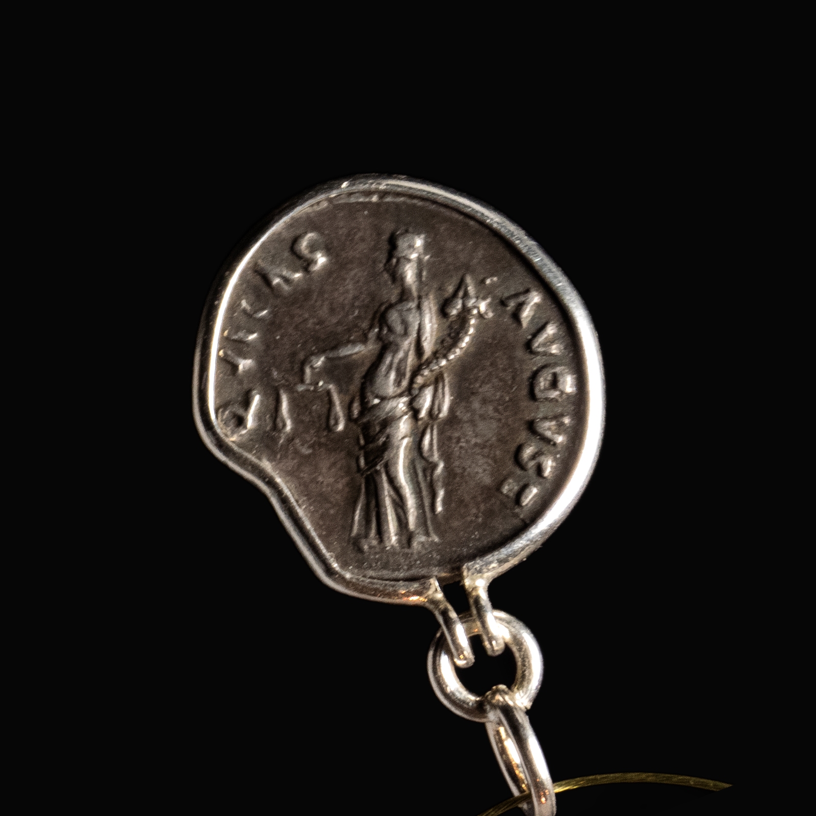 Silver pendant with Roman coin of Nerva
